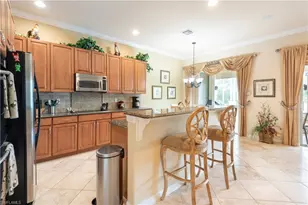 5725 Lago Villaggio Way, Naples, FL 34104 - Photo 26