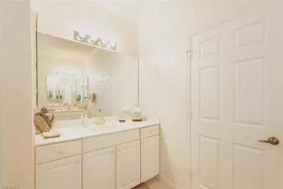 5725 Lago Villaggio Way, Naples, FL 34104 - Photo 36