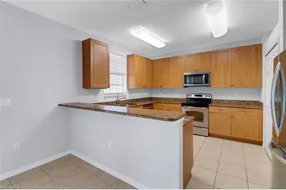 15243 Summit Place Cir #247, Naples, FL 34119 - Photo 8