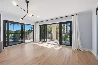 6080 Pelican Bay Blvd #205A, Naples, FL 34108 - Photo 1