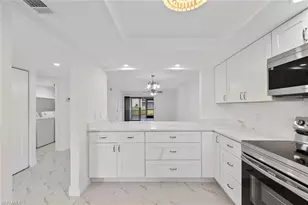 151 Cypress Way E, Naples, FL 34110 - Photo 10