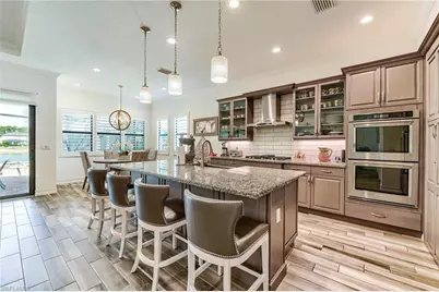 9327 Woodhurst Dr, Naples, FL 34120 - Photo 32