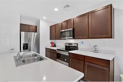15396 Wildflower Cir, Naples, FL 34119 - Photo 8