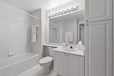 7687 Pebble Creek Cir #301, Naples, FL 34108 - Photo 18