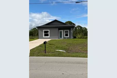 404 W 17th St, Lehigh Acres, FL 33972 - Photo 1