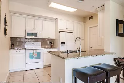 4700 Saint Croix Ln #318, Naples, FL 34109 - Photo 10