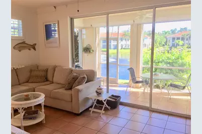 100 Lambiance Cir #1-101, Naples, FL 34108 - Photo 2