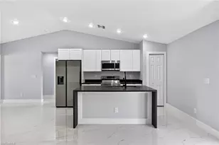 702 Carbon St E, Lehigh Acres, FL 33974 - Photo 6