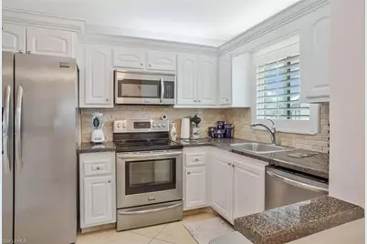 4318 27th Ct SW #101, Naples, FL 34116 - Photo 1