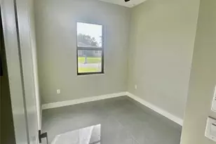 56 Floyd Ave S, Lehigh Acres, FL 33976 - Photo 16