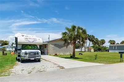 7784 Raymary St, Bokeelia, FL 33922 - Photo 1