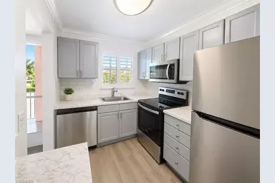 225 Turtle Lake Ct #210, Naples, FL 34105 - Photo 1