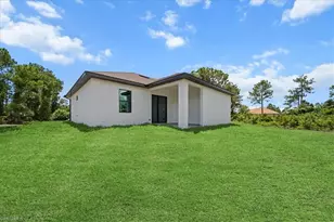 1033 Plymouth St E, Lehigh Acres, FL 33974 - Photo 6