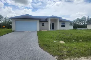 875 Cervantes St E, Lehigh Acres, FL 33974 - Photo 2
