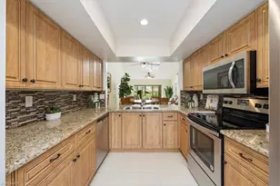 245 Deerwood Cir, Naples, FL 34113 - Photo 12
