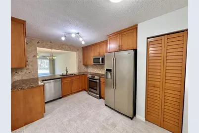 661 Squire Cir #101, Naples, FL 34104 - Photo 16