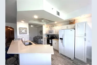 2880 Cypress Trace Cir #103, Naples, FL 34119 - Photo 10
