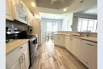 2880 Cypress Trace Cir #103, Naples, FL 34119 - Photo 6