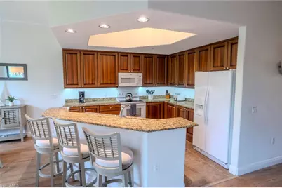 1045 Sandpiper St #G203, Naples, FL 34102 - Photo 12