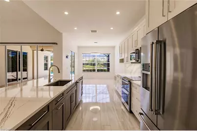 15950 Delasol Ln, Naples, FL 34110 - Photo 18