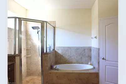27050 Eden Rock Ct, Bonita Springs, FL 34135 - Photo 10