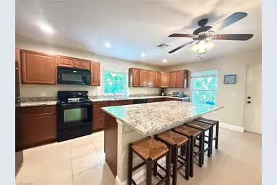 6140 Standing Oaks, Naples, FL 34119 - Photo 1