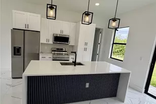 1124 Cherry St E, Lehigh Acres, FL 33974 - Photo 2