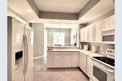 3455 Laurel Greens Ln S #103, Naples, FL 34119 - Photo 8