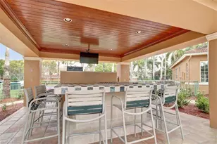 1240 Wildwood Lakes Blvd, Naples, FL 34104 - Photo 20