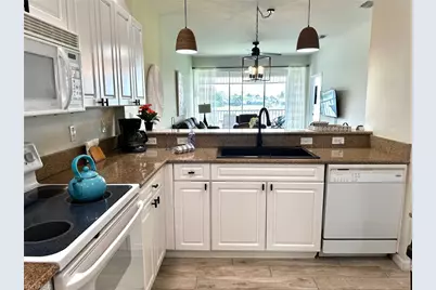 7895 Mahogany Run Ln #1422, Naples, FL 34113 - Photo 2