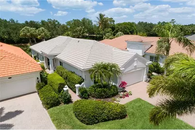 9239 Troon Lakes Dr, Naples, FL 34109 - Photo 30