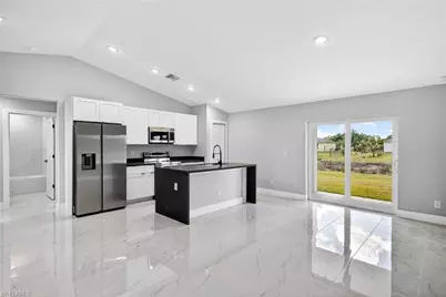 818 Portland St E, Lehigh Acres, FL 33974 - Photo 2