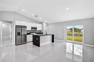 818 Portland St E, Lehigh Acres, FL 33974 - Photo 2