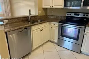 1265 Wildwood Lakes Blvd, Naples, FL 34104 - Photo 6