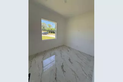 908 Winters St E, Lehigh Acres, FL 33974 - Photo 14