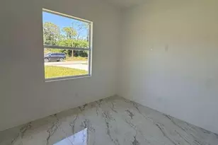 908 Winters St E, Lehigh Acres, FL 33974 - Photo 14