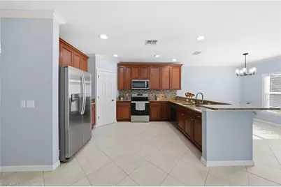 15078 Topsail Ct, Naples, FL 34119 - Photo 8