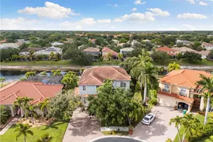 8503 Laurel Lakes Cove, Naples, FL 34119 - Photo 2