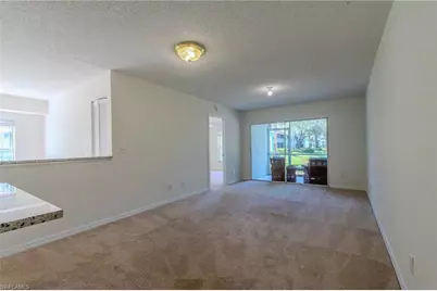 117 Wading Bird Cir #A101, Naples, FL 34110 - Photo 2