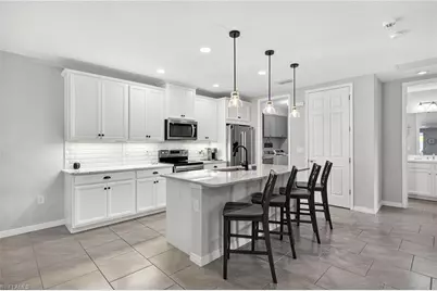 14582 Edgewater Cir, Naples, FL 34114 - Photo 6
