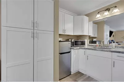 2555 Tamiami Trl N #115, Naples, FL 34103 - Photo 14