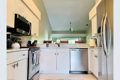 8073 Panther Trl #1404, Naples, FL 34113 - Photo 2