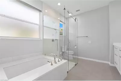 1717 Winding Oaks Way, Naples, FL 34109 - Photo 18