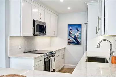 2100 Gulf Shore Blvd N #107, Naples, FL 34102 - Photo 12