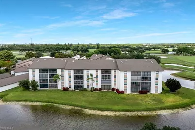 1520 Imperial Golf Course Blvd #214, Naples, FL 34110 - Photo 1