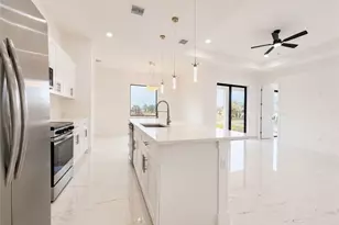 921 Martha Ave S, Lehigh Acres, FL 33974 - Photo 6