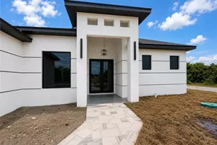 921 Martha Ave S, Lehigh Acres, FL 33974 - Photo 2