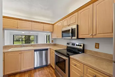 1208 Commonwealth Cir #J 206, Naples, FL 34116 - Photo 10