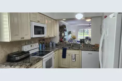 219 Fox Glen Dr #1107, Naples, FL 34104 - Photo 2