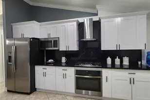 111 2nd St SE, Naples, FL 34117 - Photo 1